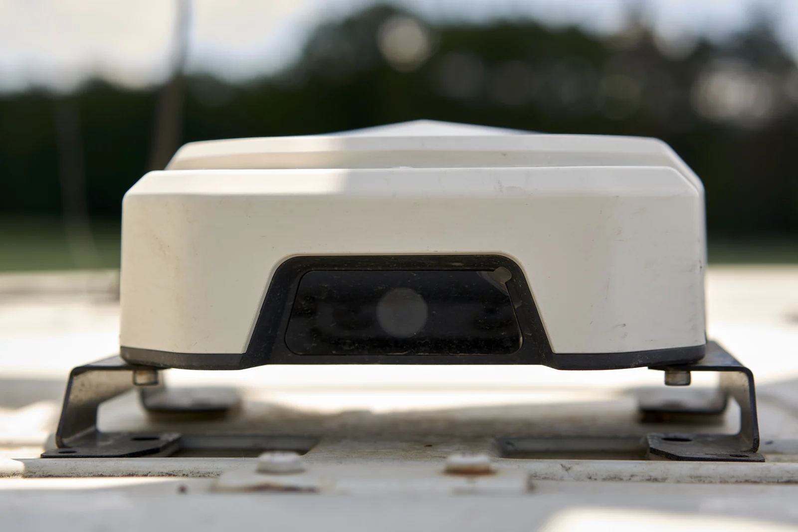 NanoSteer GNSS receiver mounted on a tractor cab