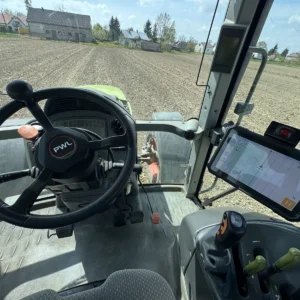 NanoSteer 210 terminal and motorised steering wheel installed in a tractor